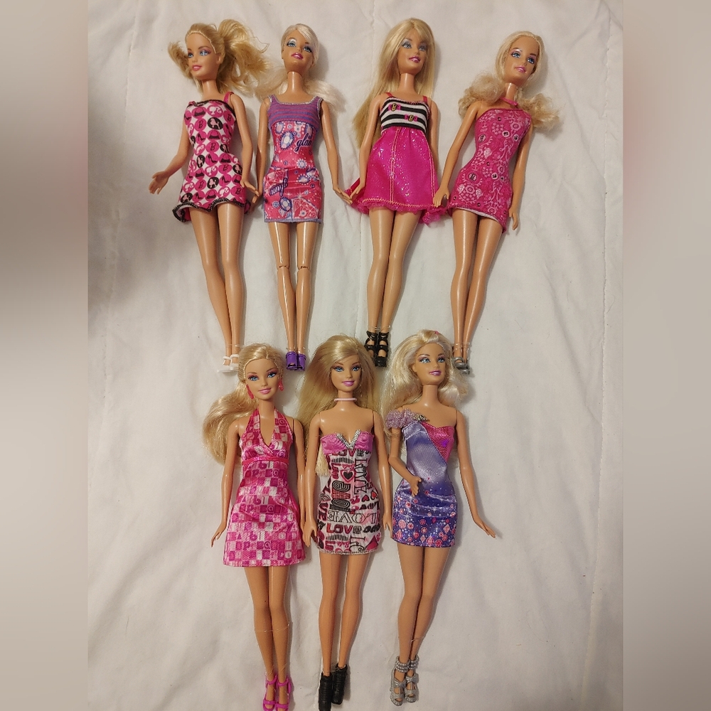 Set of 7 Barbie Fashion Dolls in Pink and Purple Dresses